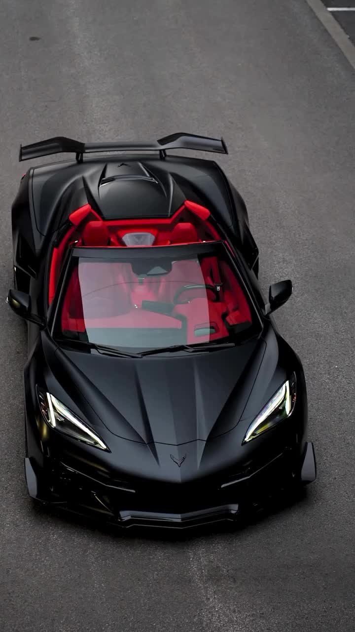 Black Sports Car in Motion Download Wallpapers