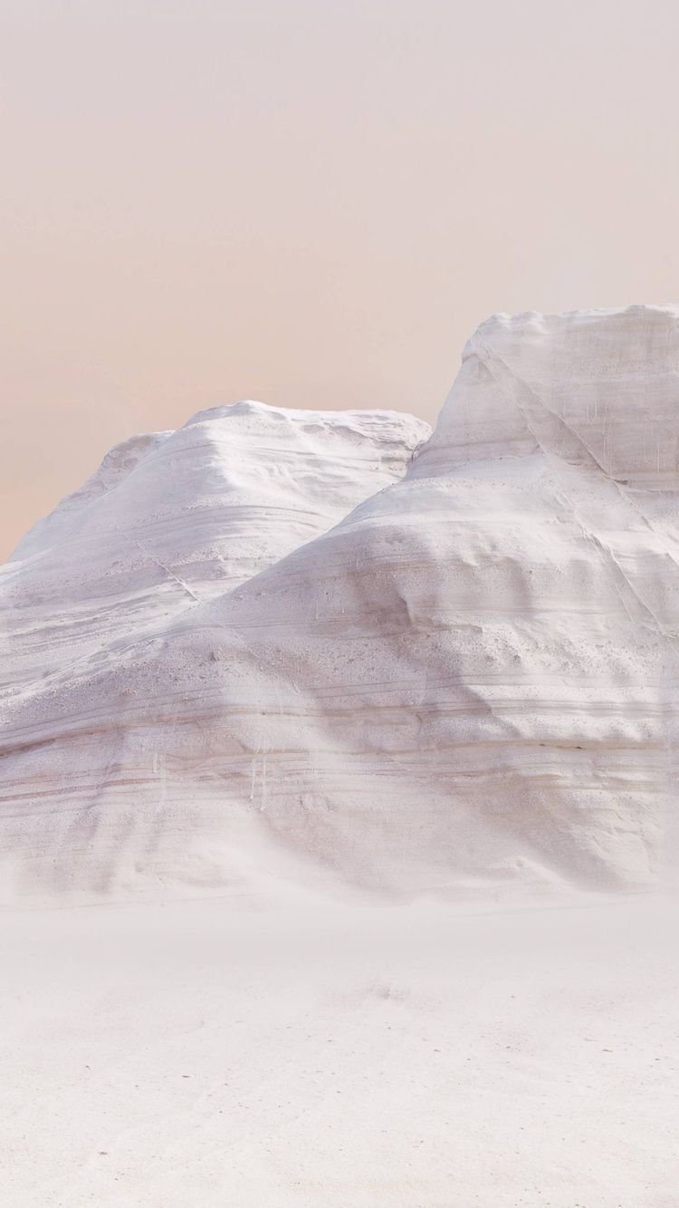 Snowboarder on Distant Slopes Download Wallpapers