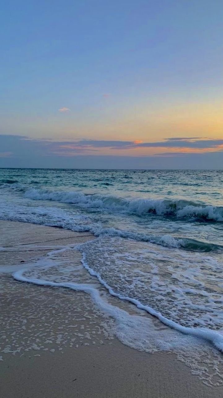 Golden Sunset Over Ocean Waves Download Wallpapers